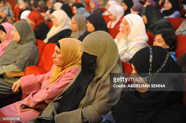 Moroccan women attend the meeting of the feminist organisation "Mountada Azzahrae pour la femme marocaine" in Casablanca on June 11, 2010. The...