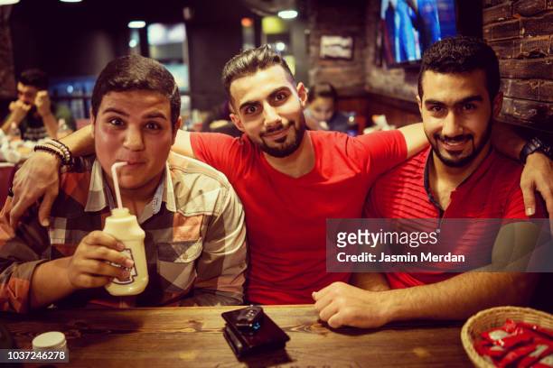 group of arab boys together - jordan or jordanian or the hashemite kingdom of jordan people or citizens ストックフォトと画像