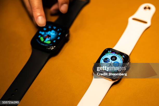 Customer views Apple Watch Series 4 smartwatches during a sales launch at an Apple Inc. Store in New York, U.S., on Friday, Sep. 21, 2018. The iPhone...