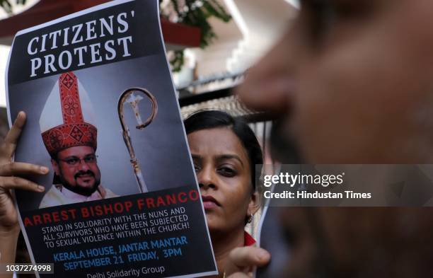 People hold a protest against Bishop Franco Mulakkal for his arrest outside the Kerala House, on September 21, 2018 in New Delhi, India. Bishop...