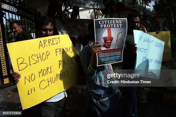 People hold a protest against Bishop Franco Mulakkal for his arrest outside the Kerala House, on September 21, 2018 in New Delhi, India. Bishop...