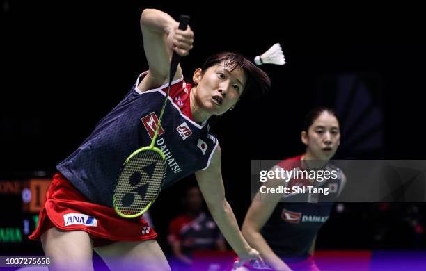 Shiho Tanaka and Koharu Yonemoto of Japan compete in the Women's Doubles quarter finals match against Greysia Polii and Apriyani Rahayu of Indonesia...