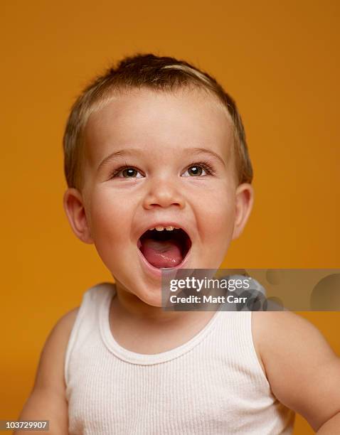 baby laughing - vest stock pictures, royalty-free photos & images