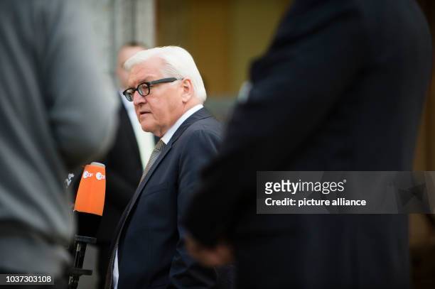 German Foreign Minister Frank-Walter Steinmeier arrives to a meeting of the OSCE troika in Villa Borsig in Berlin, Germany, 12 April 2016. The...