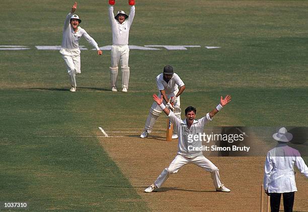 Richard Hadlee of New Zealand traps an Indian batsmen for another wicket in the Second Test match in Bombay, India. \ Mandatory Credit: Simon Bruty...