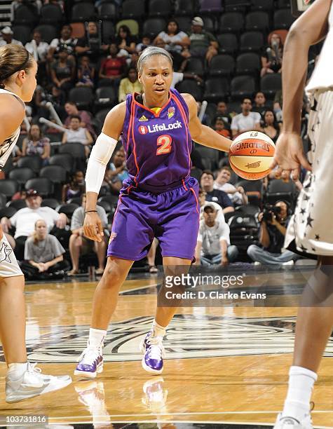 Temeka Johnson of the Phoenix Mercury handles the ball during Game Two of the WNBA Western Conference Semi-Finals against San Antonio Silver Stars on...