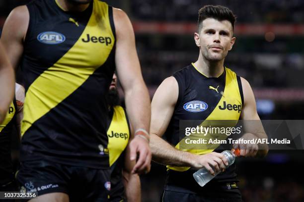 Trent Cotchin of the Tigers looks dejected after a loss during the 2018 AFL First Preliminary Final match between the Richmond Tigers and the...