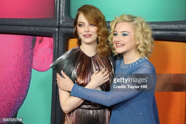 Emma Stone and Julia Garner attend the Season One premiere of Netflix's "Maniac" at Center 415 on September 20, 2018 in New York City.