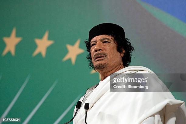 Muammar Qaddafi, Libya's leader, speaks at an equestrian show at the Tor di Quinto cavalry school in Rome, Italy, on Monday, Aug. 30, 2010. Italy's...