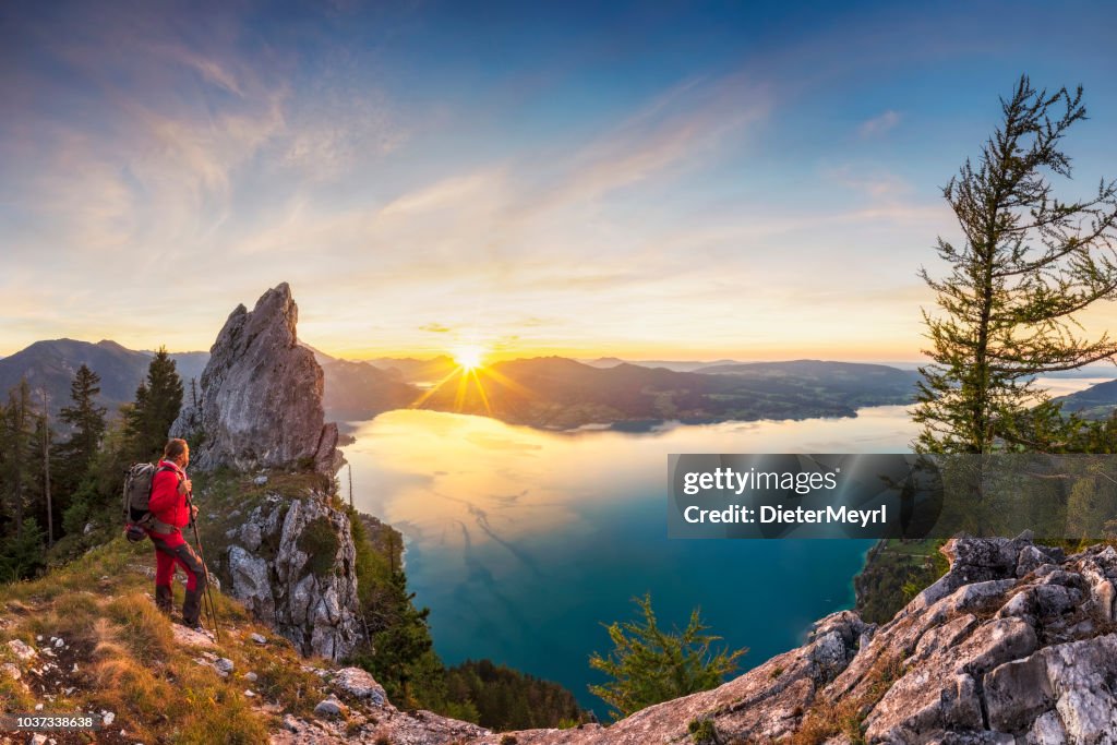 Mountain Climber at sunset with View To Lake Attersee from Schober- Sunset at Mount Schoberstein, Alps