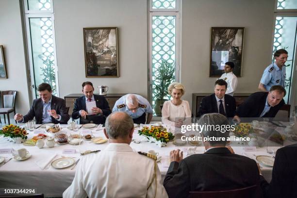 German Minister of Defence Ursula von der Leyen with her staff during a short breakfast in the residence of the German Ambassador in New Delhi,...