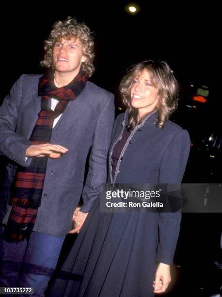 Actor Al Corley and Musician Carly Simon attend Marci Klein's Sweet Sixteen Birthday Party on October 22, 1982 at Studio 54 in New York City, New...
