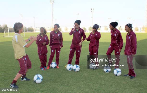 German national soccer team coach of the Qatari women Monika Staab stands on the practice field in Doha, Qatar, 05 March 2014. For more than a year,...