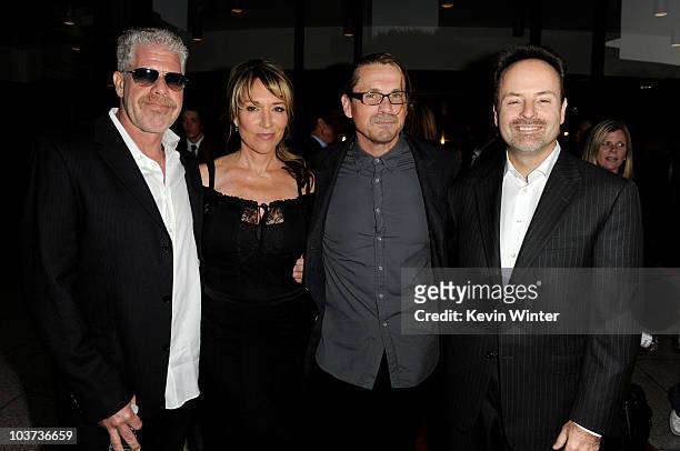 Actors Ron Perlman, Katey Sagal, her husband series creator/executive producer Kurt Sutter and FX president John Landgraf pose at the season three...