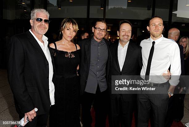 Actors Ron Perlman, Katey Sagal, her husband series creator/executive producer Kurt Sutter, FX president John Landgraf and actor Charlie Hunnam pose...