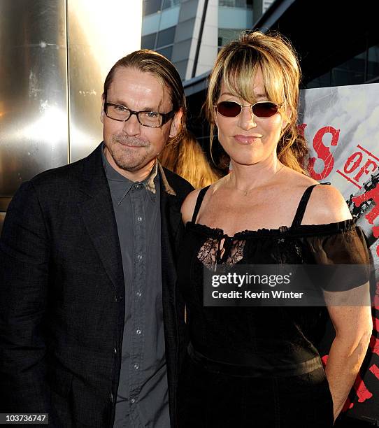 Series creator/executive producer Kurt Sutter and his wife actress Katey Sagal arrive at the season three premiere screening of FX's "Sons of...