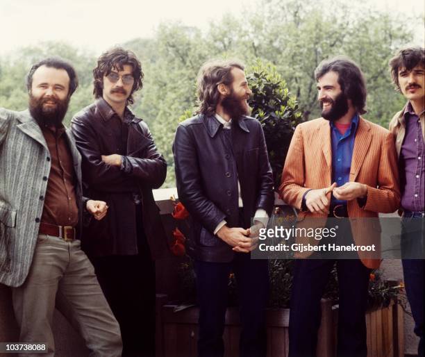 Garth Hudson, Robbie Robertson, Levon Helm, Richard Manuel and Rick Danko of The Band pose for a group portrait in June 1971 in London.