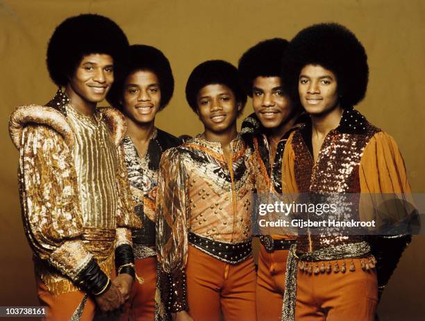 Jackie Jackson, Marlon Jackson, Randy Jackson, Tito Jackson and Michael Jackson of the Jacksons pose for a studio group portrait in 1977 in...