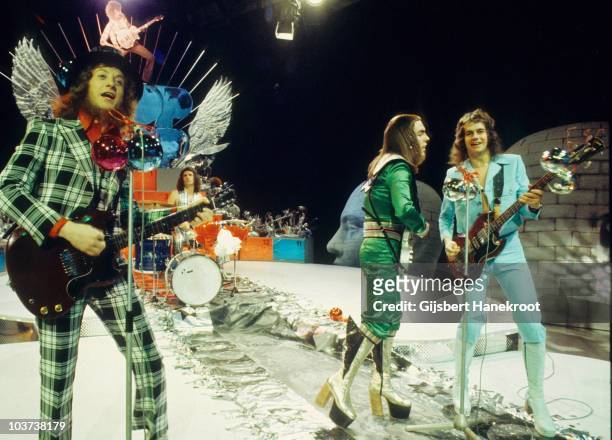 Noddy Holder, Don Powell, Dave Hill and Jim Lea of Slade perform on a Christmas TV show in December 1973 in Hilversum, netherlands.