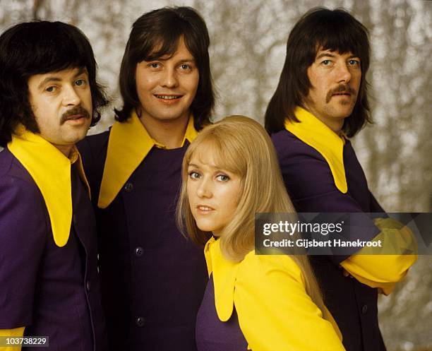 Ken Andrew, Eric McCredie, Sally Carr and Ian McCredie of Middle Of The Road pose for a studio group portrait in 1972 in Amsterdam, Netherlands.