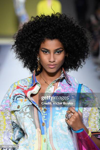 Imaan Hammam walks the runway at the Versace show during Milan Fashion Week Spring/Summer 2019 on September 21, 2018 in Milan, Italy.