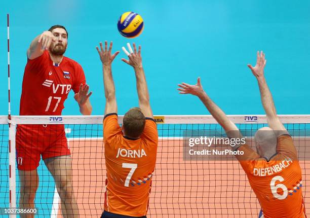 Netherlands v Russia - FIVP Men's World Championship Second Round Pool E Gijs Jorna of Netherlands blocks on Maxim Mikhaylov of Russia at Mediolanum...