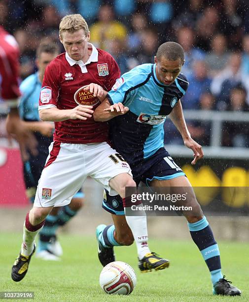 Billy McKay of Northampton Town contests the ball with Lewis Montrose of Wycombe Wanderers during the npower LeagueTwo match between Northampton Town...