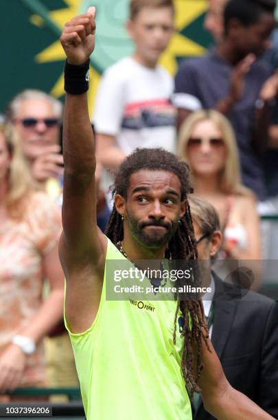 German tennis player Dustin Brown gestures after the match against Russian tennis player Kuznetsov at the ATP tournament in Halle , Germany, 09 June...