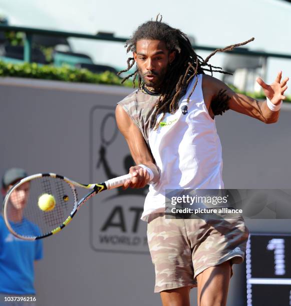 German tennis player Dustin Brown in action during the match against Lu at the ATP tournament Duesseldorf Open in Duesseldorf, Germany, 19 May 2014....