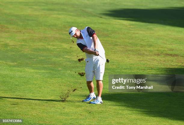 Ben Homewood of Worldham Golf Club plays his second shot on the 1st fairway during Day Two of The Lombard Trophy Grand Final on September 21, 2018 in...