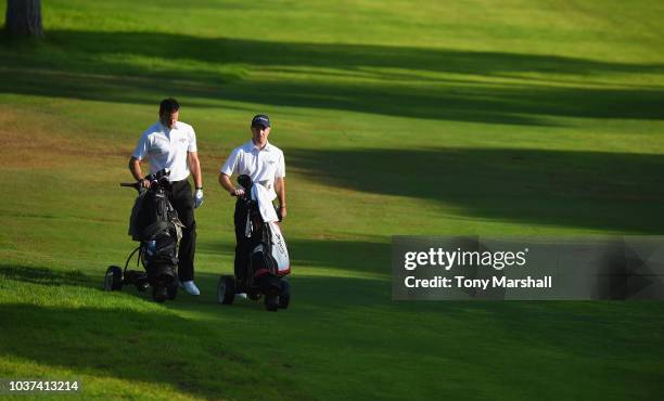 Matthew Dearden and David Gooding of Glamorganshire Golf Club walk down the 1st fairway during Day Two of The Lombard Trophy Grand Final on September...