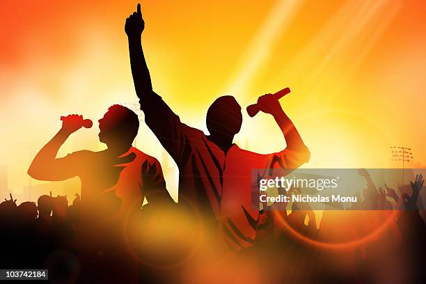rapper holding microphone photos and premium high res... 72 Rapper With Microphone High Res Illustrations - Getty Images