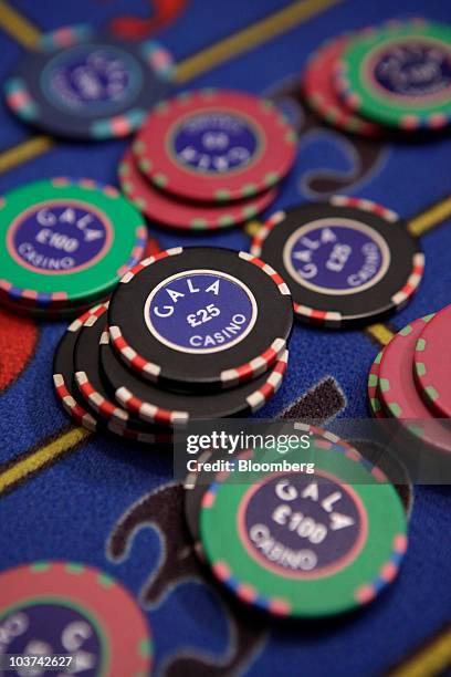 Branded gaming chips sit on a roulette table at a Gala Casino, operated by Gala Coral Group Ltd., in London, U.K., on Monday, Aug. 30, 2010. Gala...