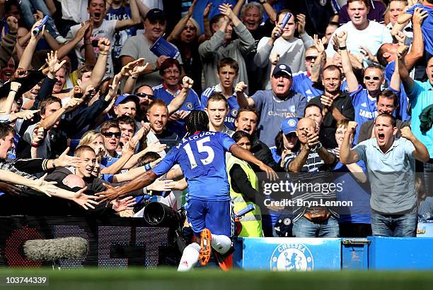 Florent Malouda of Chelsea celebrates with the fans after scoring the opening goal during the Barclays Premier League match between Chelsea and Stoke...