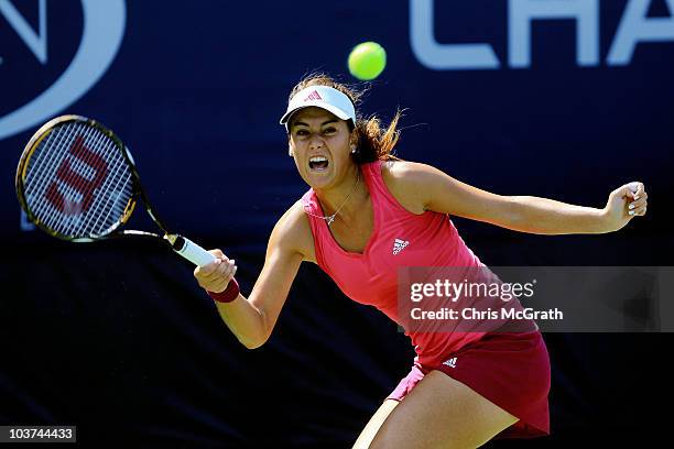 Sorana Cirstea of Romania hits a return against Sofia Arvidsson of Sweden during her first round women's singles match on day two of the 2010 U.S....