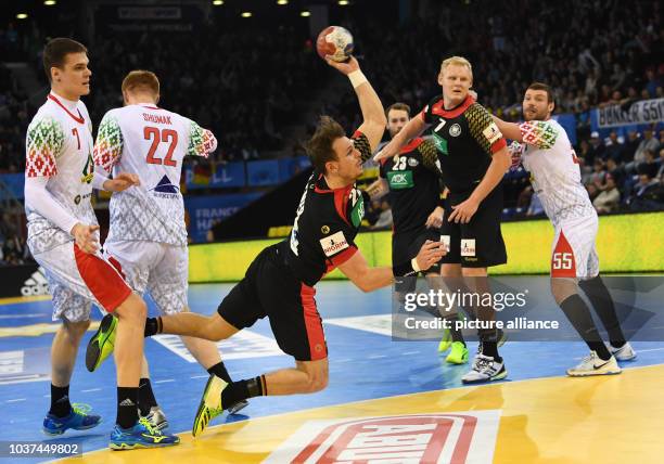 Germany's Kai Haefner in action during the men's Handball World Cup match between Belarus and Germany in Rouen, France, 18 January 2017. Photo:...