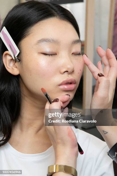 Model Yoon Young Bae is seen backstage ahead of the Blumarine show during Milan Fashion Week Spring/Summer 2019 on September 21, 2018 in Milan, Italy.