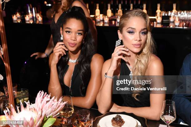 Laura Harrier and Jasmine Sanders are seen at the Bulgari Milan SS 2019 Dinner Party on September 21, 2018 in Milan, Italy.