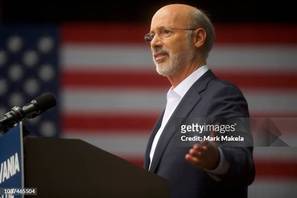 Pennsylvania Governor Tom Wolf addresses supporters before former President Barack Obama speaks during a campaign rally for statewide Democratic...