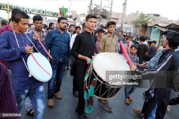 Pakistani Sunni Muslim devotees take part in an Ashura procession in Karachi on September 21, 2018.