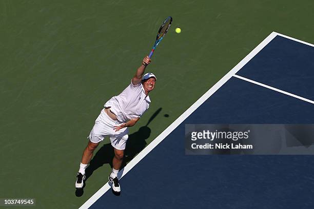 Jan Hajek of the Czech Republic serves against Mardy Fish of the United States during his first round men's single's match on day two of the 2010...
