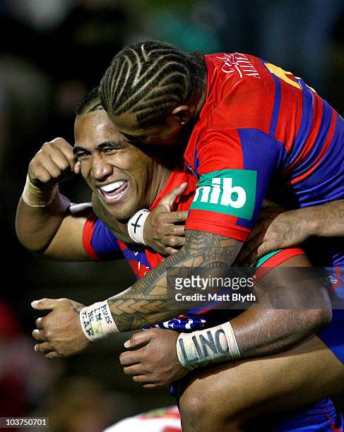 Cooper Vuna of the Knights celebrates scoring a try during the round 25 NRL match between the Newcastle Knights and the St George Illawarra Dragons...