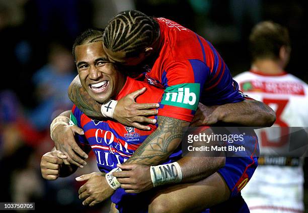 Cooper Vuna of the Knights celebrates scoring a try during the round 25 NRL match between the Newcastle Knights and the St George Illawarra Dragons...