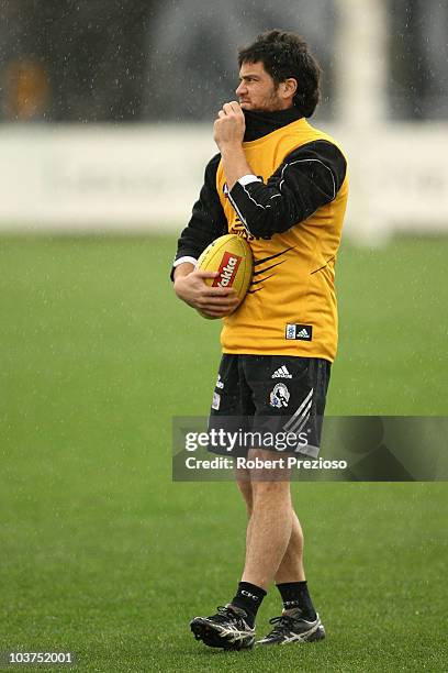 Paul Medhurst warms up during a Collingwood Magpies AFL training session at Gosch's Paddock on September 1, 2010 in Melbourne, Australia.