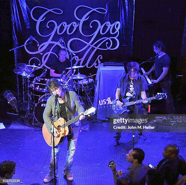 The Goo Goo Dolls drummer Mike Malinin, keyboardist Korel Tunador, lead vocalist John Rzeznik and bass guitarist Robby Takac perform as part of...