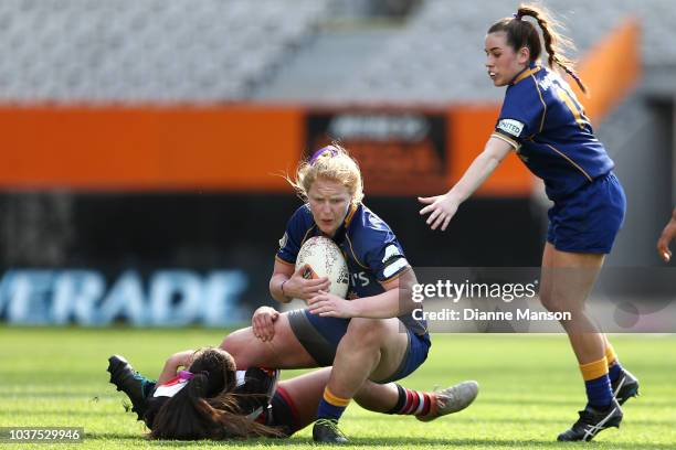 Greer Muir of Otago is tackledduring the round four Farah Palmer Cup match between Otago and Counties Manukau at Forsyth Barr Stadium on September...