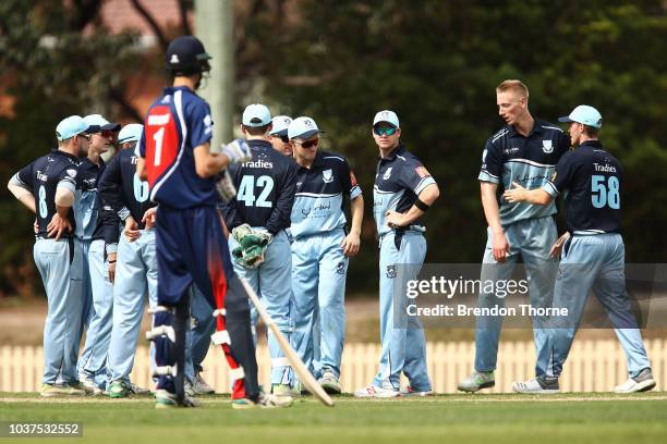 Steve Smith celebrates with team mates during the NSW First Grade Club Cricket match between Sutherland and Mosman at Glenn McGrath Oval on September...