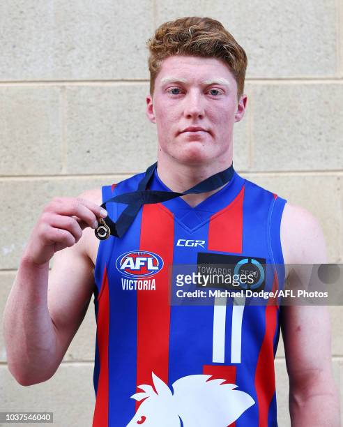 Best on ground Matthew Rowell of the Chargers poses with his medal during the 2018 TAC Cup Grand Final match between Dandenong and Oakleigh at Ikon...