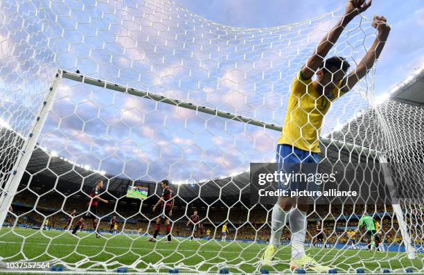 Fred of Brazil reacts during the FIFA World Cup 2014 semi-final soccer match between Brazil and Germany at Estadio Mineirao in Belo Horizonte,...