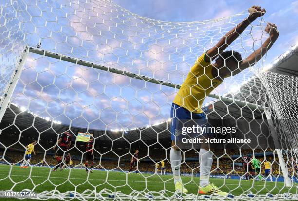 Fred of Brazil reacts during the FIFA World Cup 2014 semi-final soccer match between Brazil and Germany at Estadio Mineirao in Belo Horizonte,...